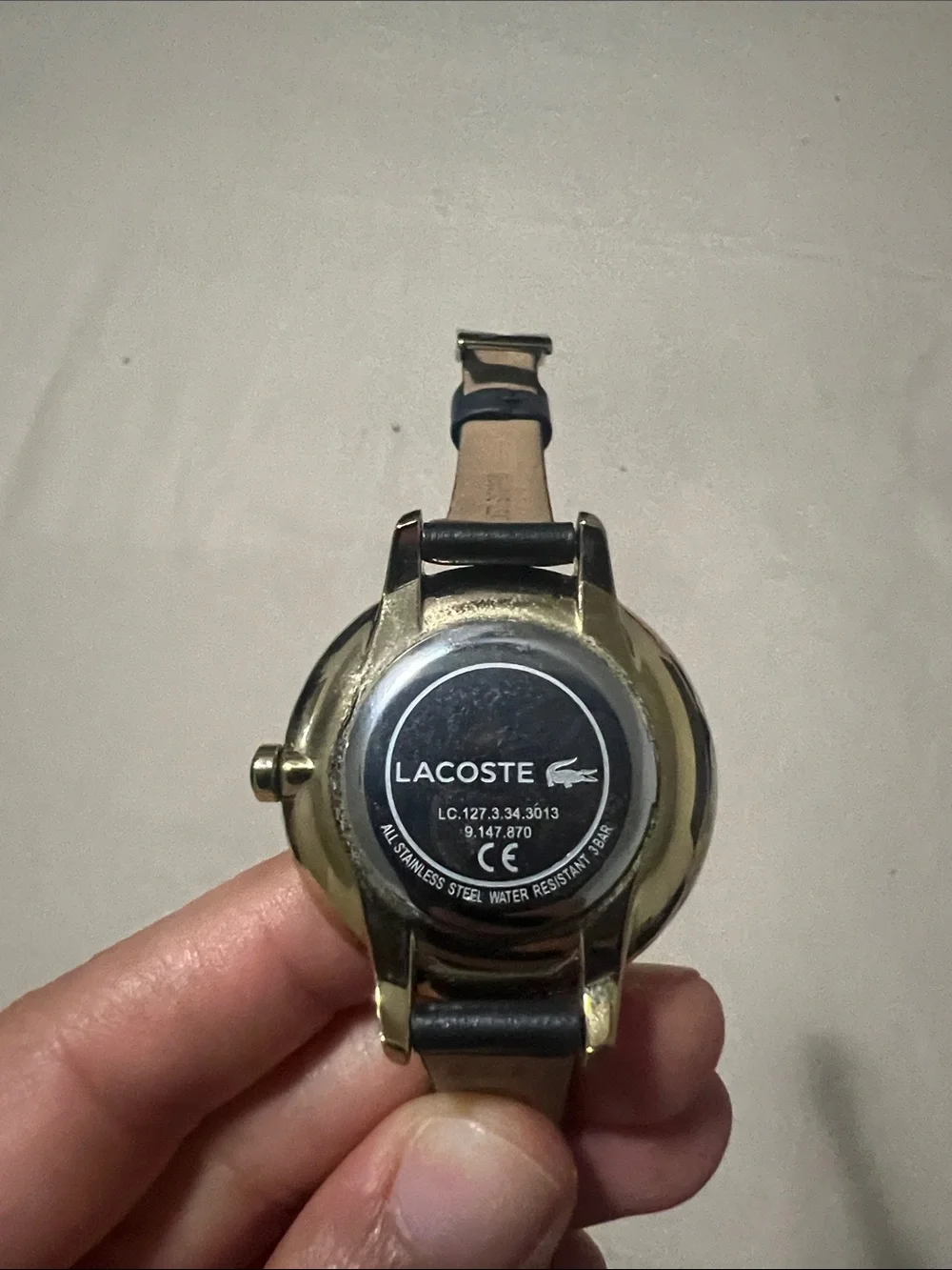 Women’s Lacoste Silver Dial Watch with Black Leather Strap